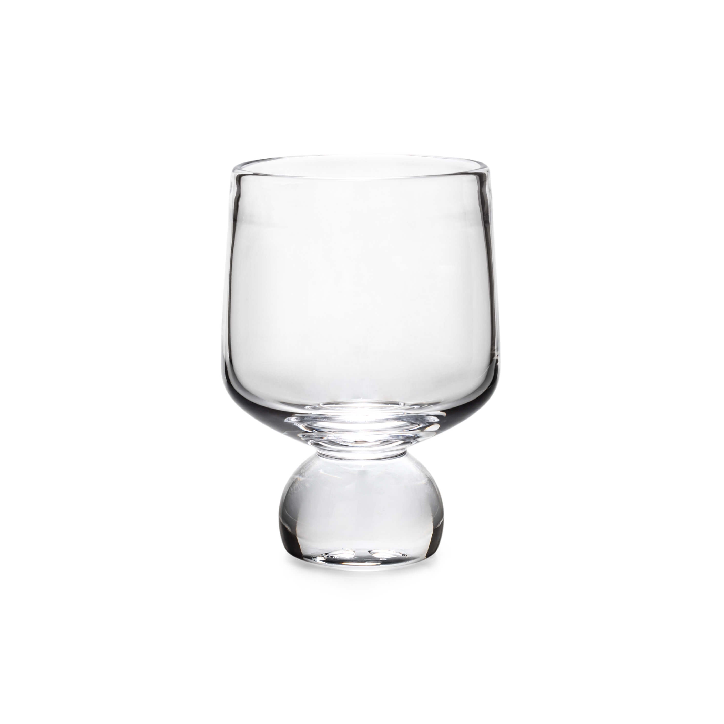 Clear glass tumbler with rounded bowl shape and bulbous pedestal base.