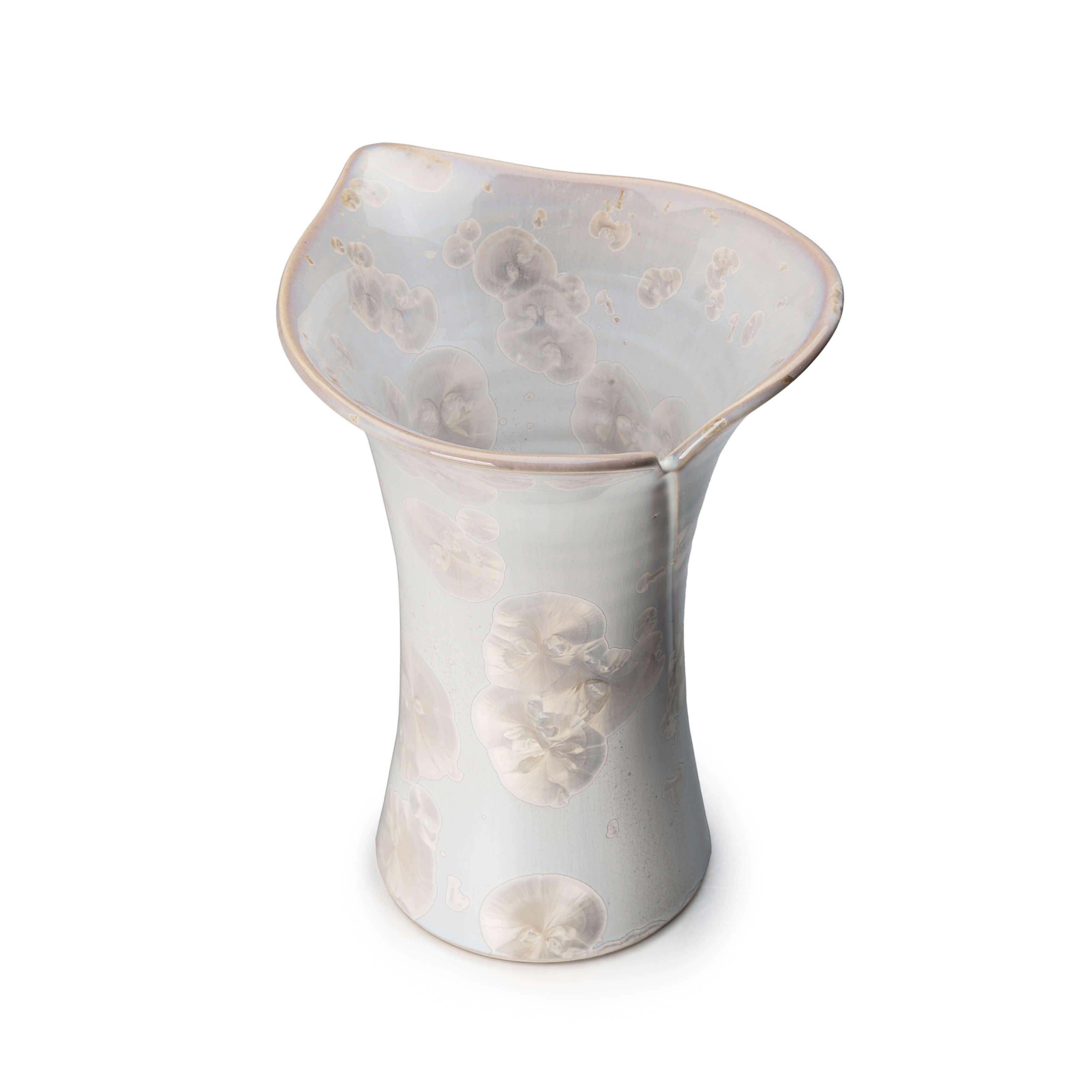 Translucent white vase with flared rim and embossed calla lily floral motifs throughout the cylindrical body.