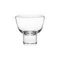 Clear glass martini glass with wide bowl and narrow pedestal stem.