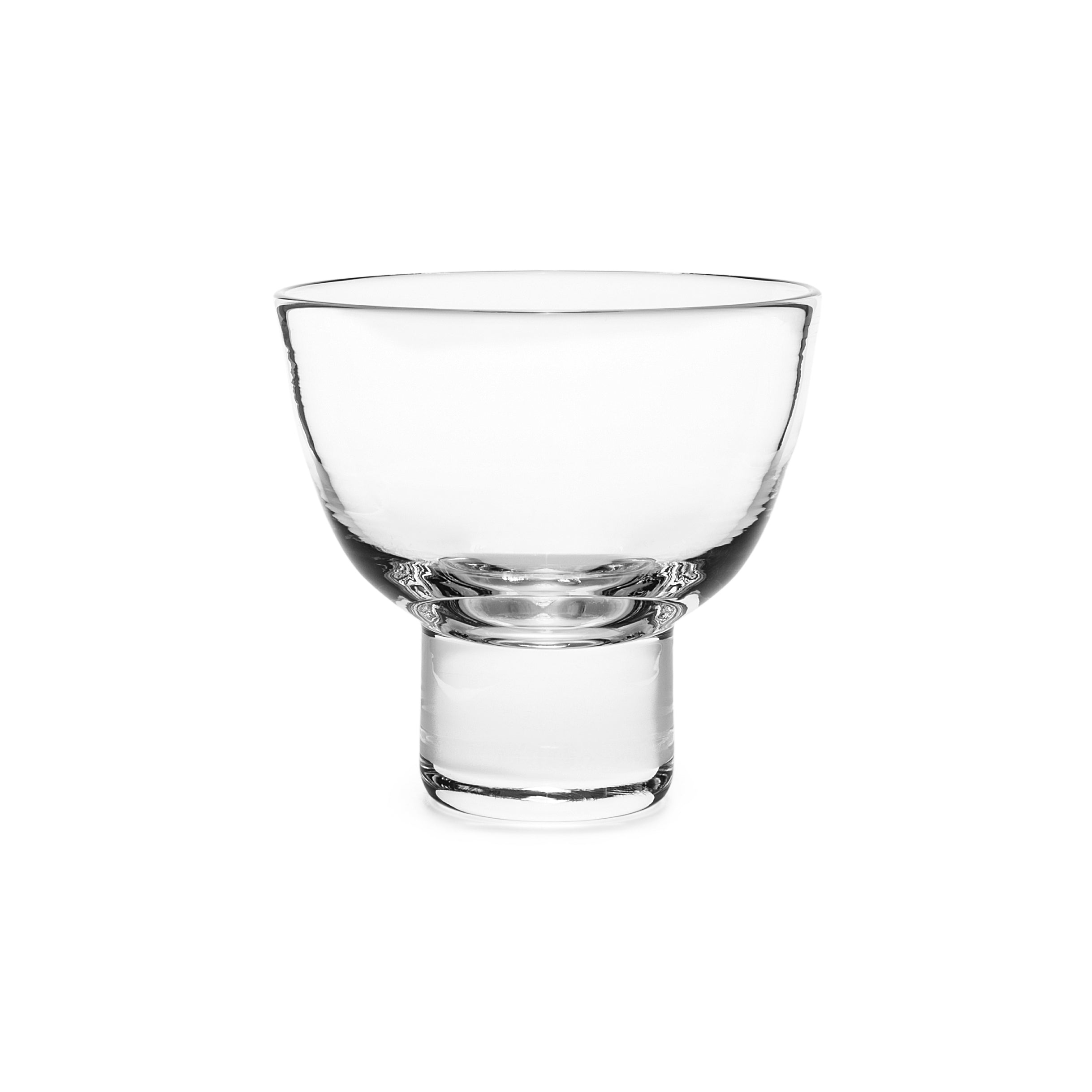 Clear glass martini glass with wide bowl and narrow pedestal stem.