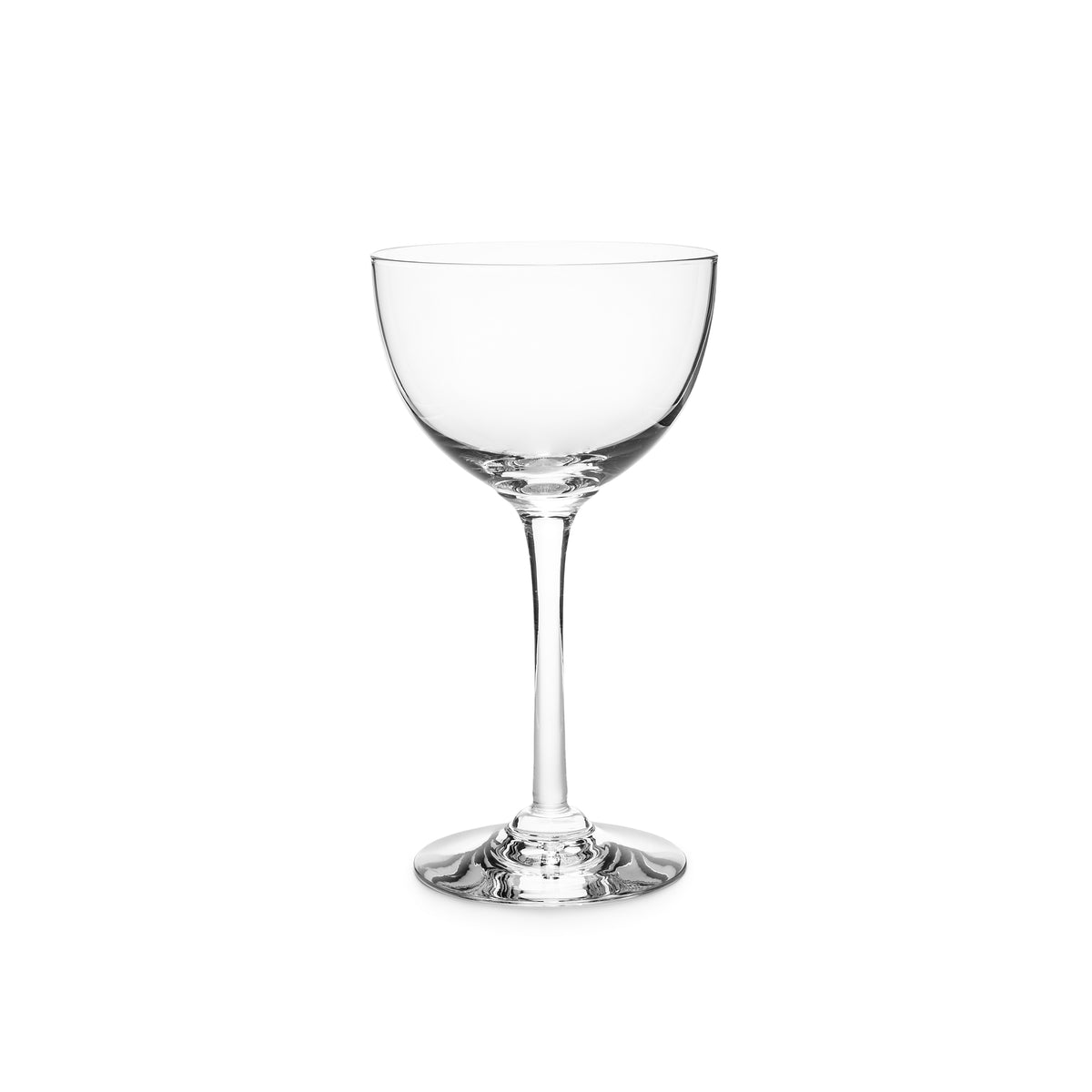 Clear coupe glass with wide bowl, thin stem, and broad base.
