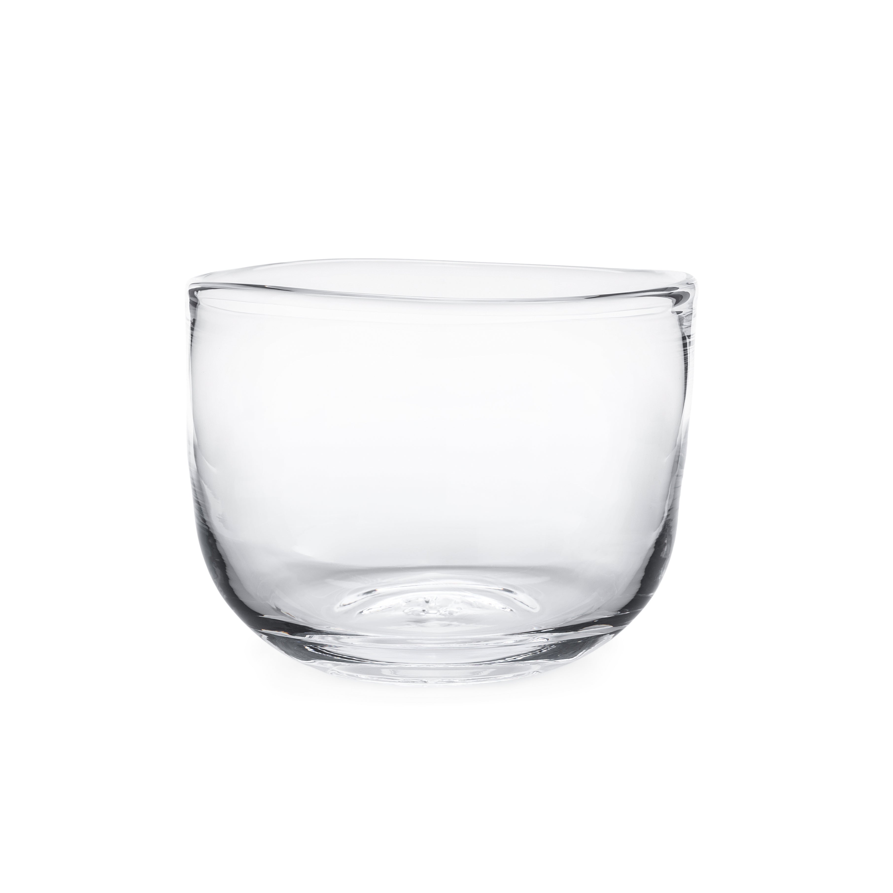 Clear glass bowl with wide rounded sides and flat bottom.