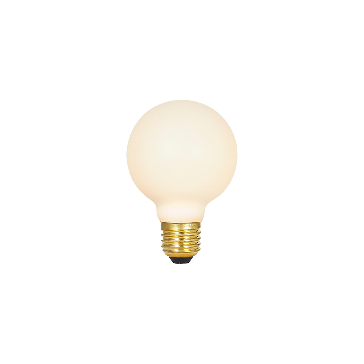 Matte porcelain spherical LED bulb with brass screw base and warm white glow.