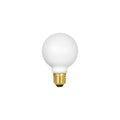 Spherical matte white LED bulb with brass threaded base and black contact point.