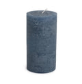 Cylindrical pillar candle in lupine blue with a textured surface and single wick on top.