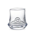 Clear glass tumbler with curved sides and circular emblem on front.