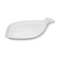 White fish-shaped ceramic platter with textured surface and raised rim.