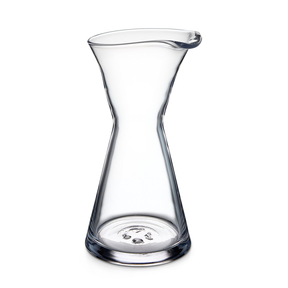 Clear glass pitcher with hourglass silhouette and pouring spout on tapered sides.