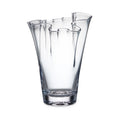 Clear glass vase with flared, wavy rim and tapered cylindrical body.