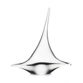 White sculptural sailboat form with pointed top and curved sail-like sides, viewed from the front against white background.