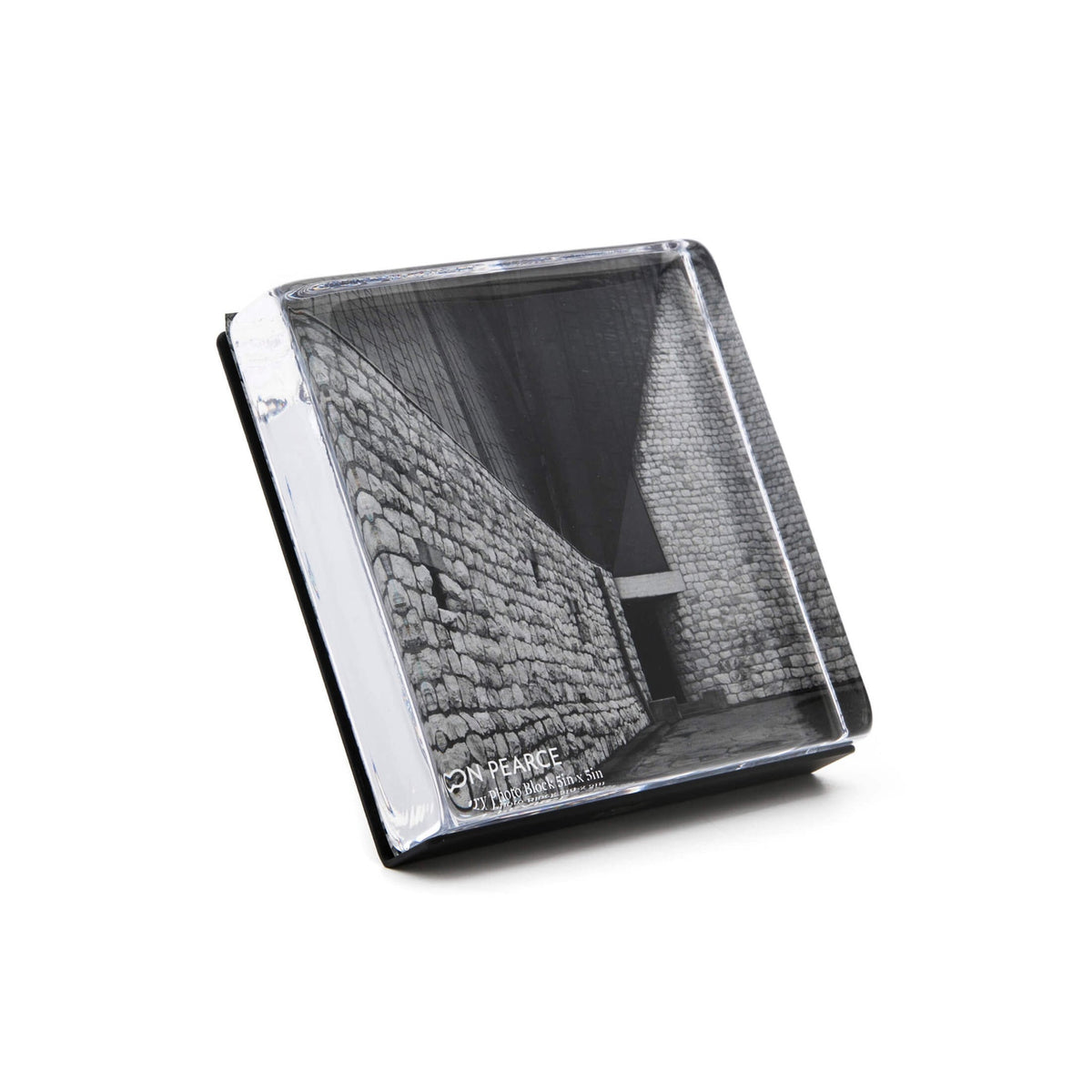 Clear acrylic photo block with black and white architectural image inside white gift box packaging.