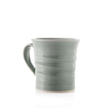 Celadon ceramic mug with crackle glaze finish and horizontal ridged detail on body.