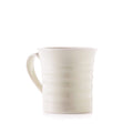 Ivory ceramic mug with crackle texture pattern and handle.