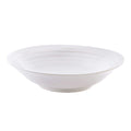 White ceramic bowl with concentric circular ridges and a wide shallow shape.