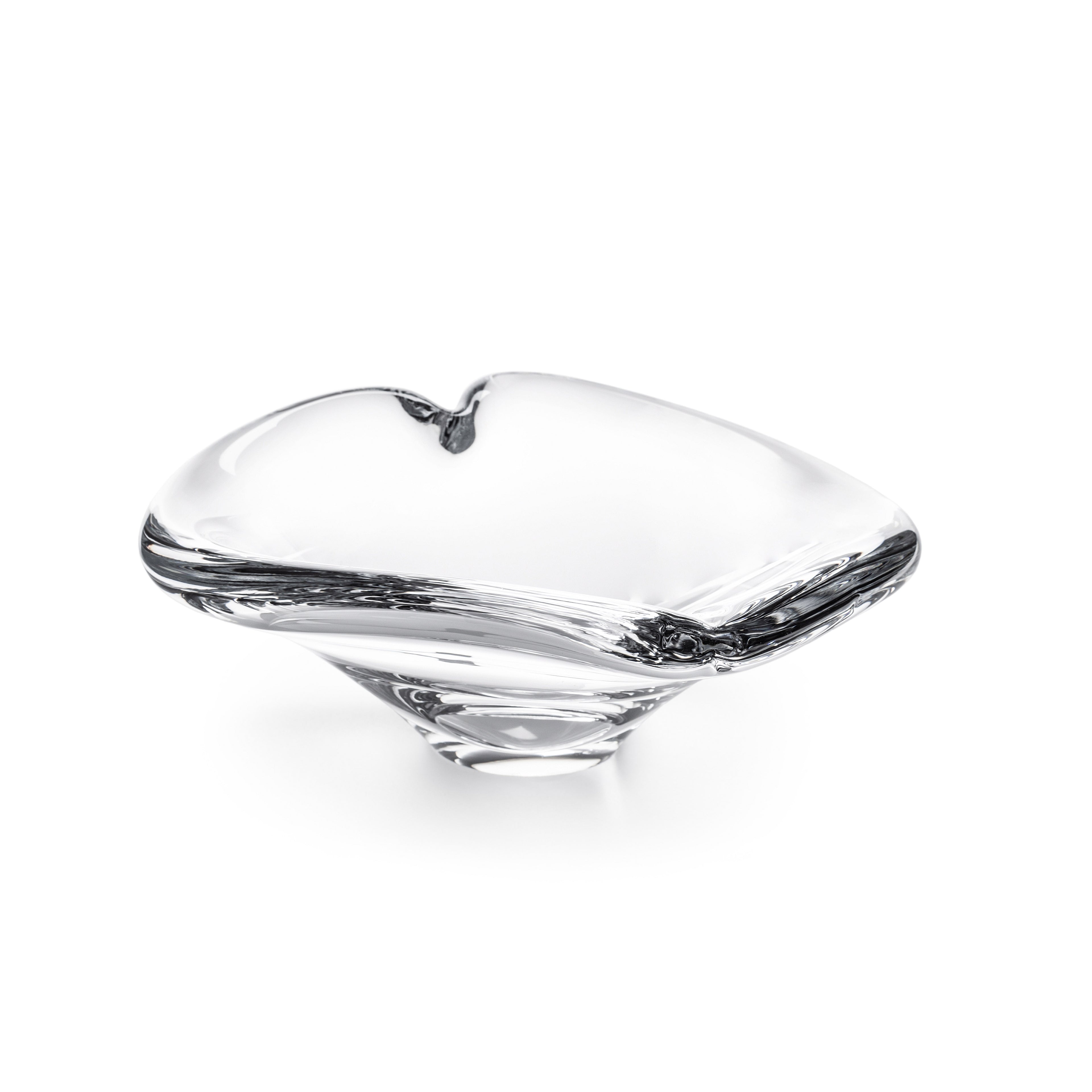 Clear glass dish with heart-shaped top and black branch-like handles on sides.