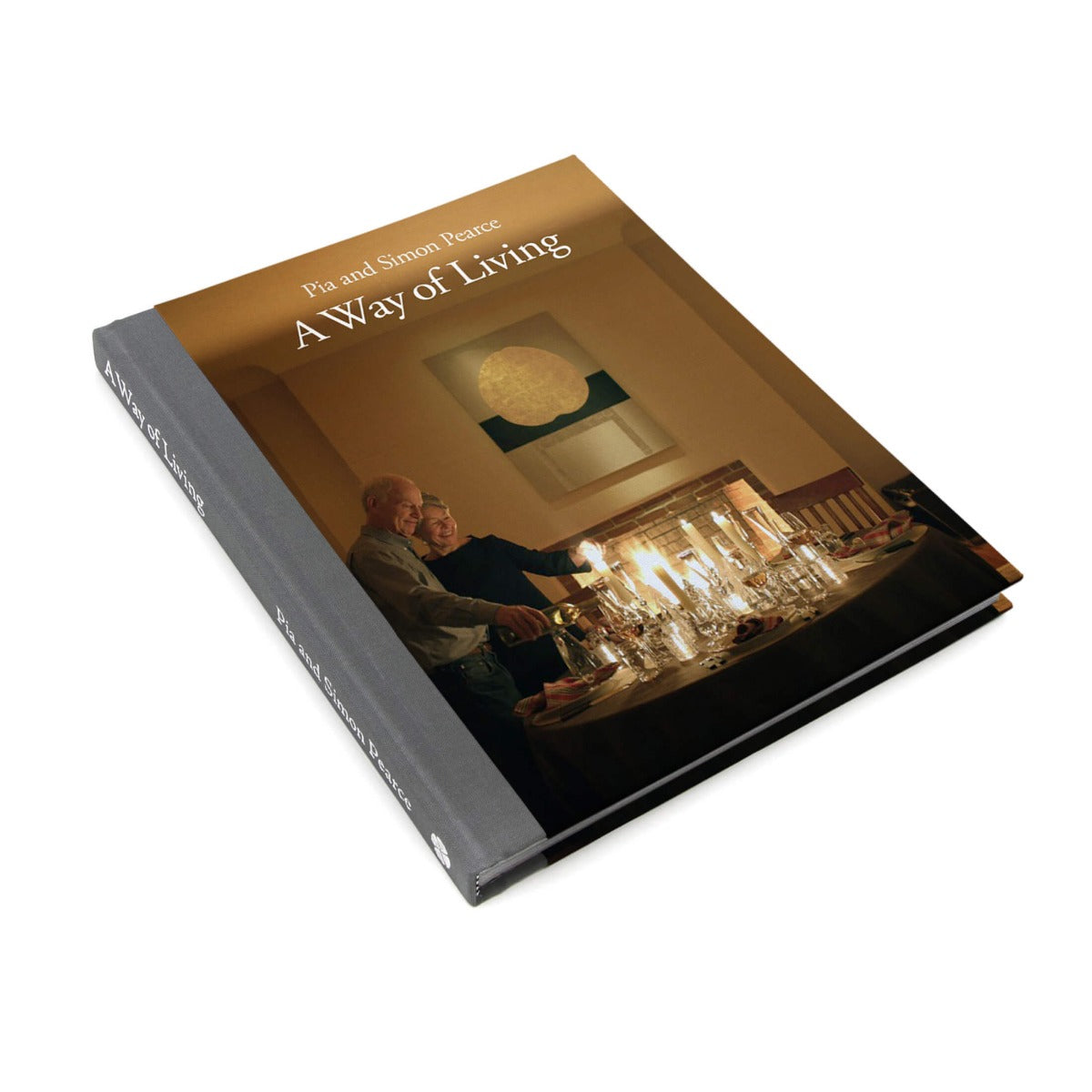Hardcover book titled "A Way of Living" by Pia and Simon Pearce with cover showing two people seated indoors.