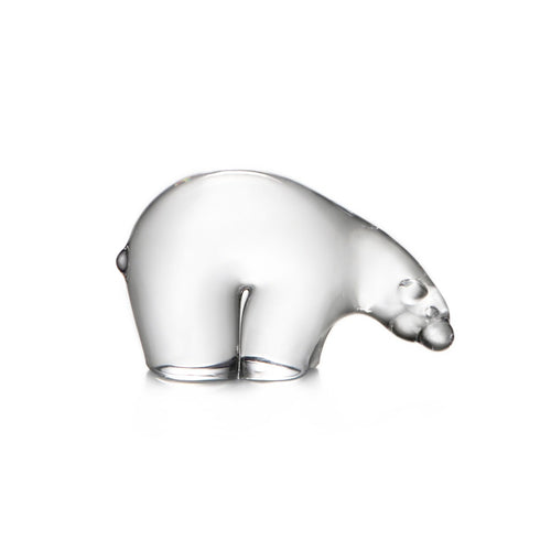 Small clear glass polar bear figurine with detailed facial features and standing pose.