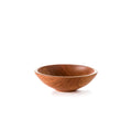 Cherry wood bowl with smooth, curved sides and a light-colored rim on a white background.