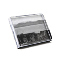 Clear acrylic photo block displaying black and white landscape image with chairs, water, and mountains.