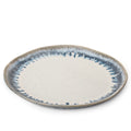 Round ceramic dinner plate with cream center and blue-grey brushstroke border pattern.