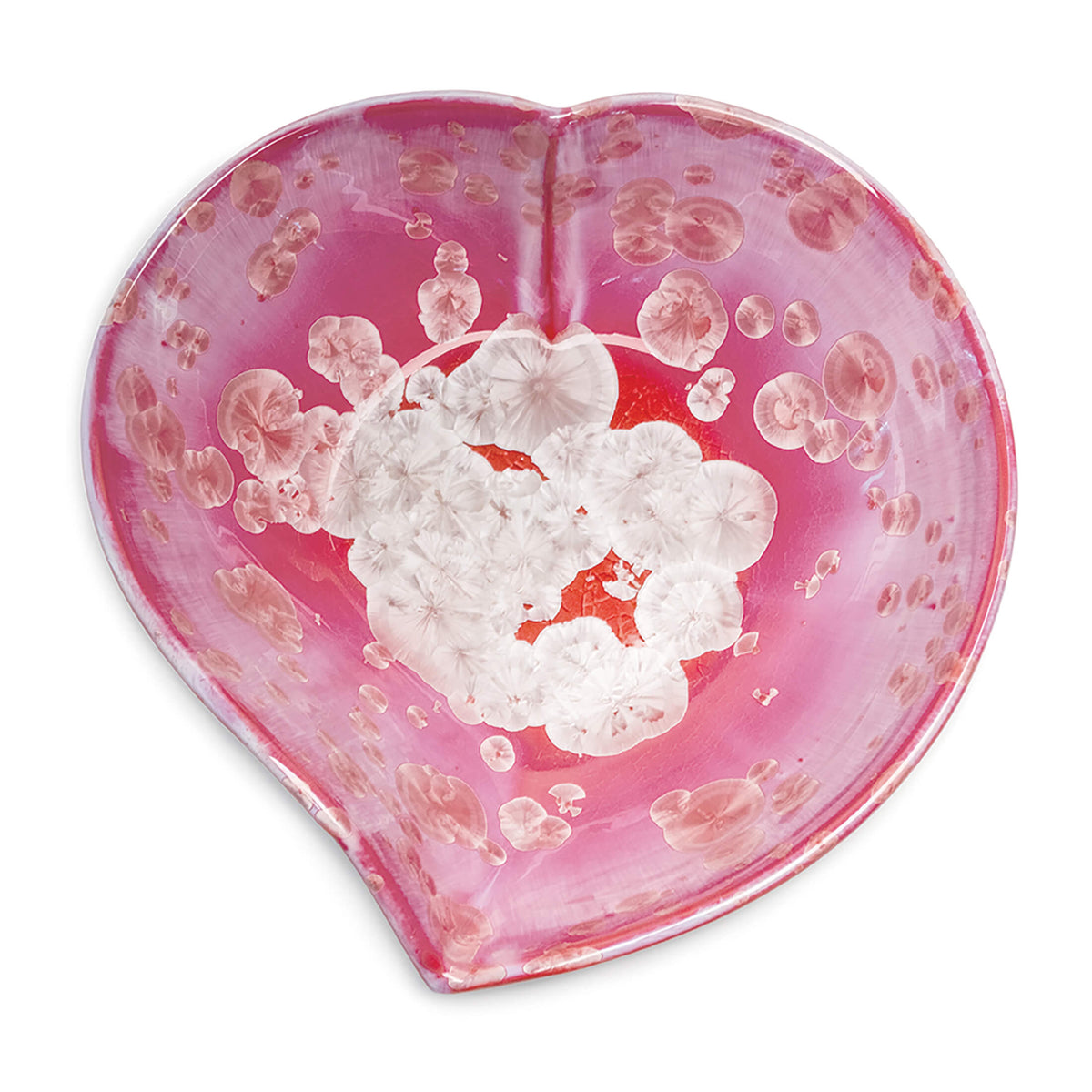 Heart-shaped bowl with pink resin base, white and red floral elements, and embedded circular crystalline details throughout.