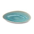 Ceramic dinner plate with lagoon blue glaze and speckled texture on white rim.