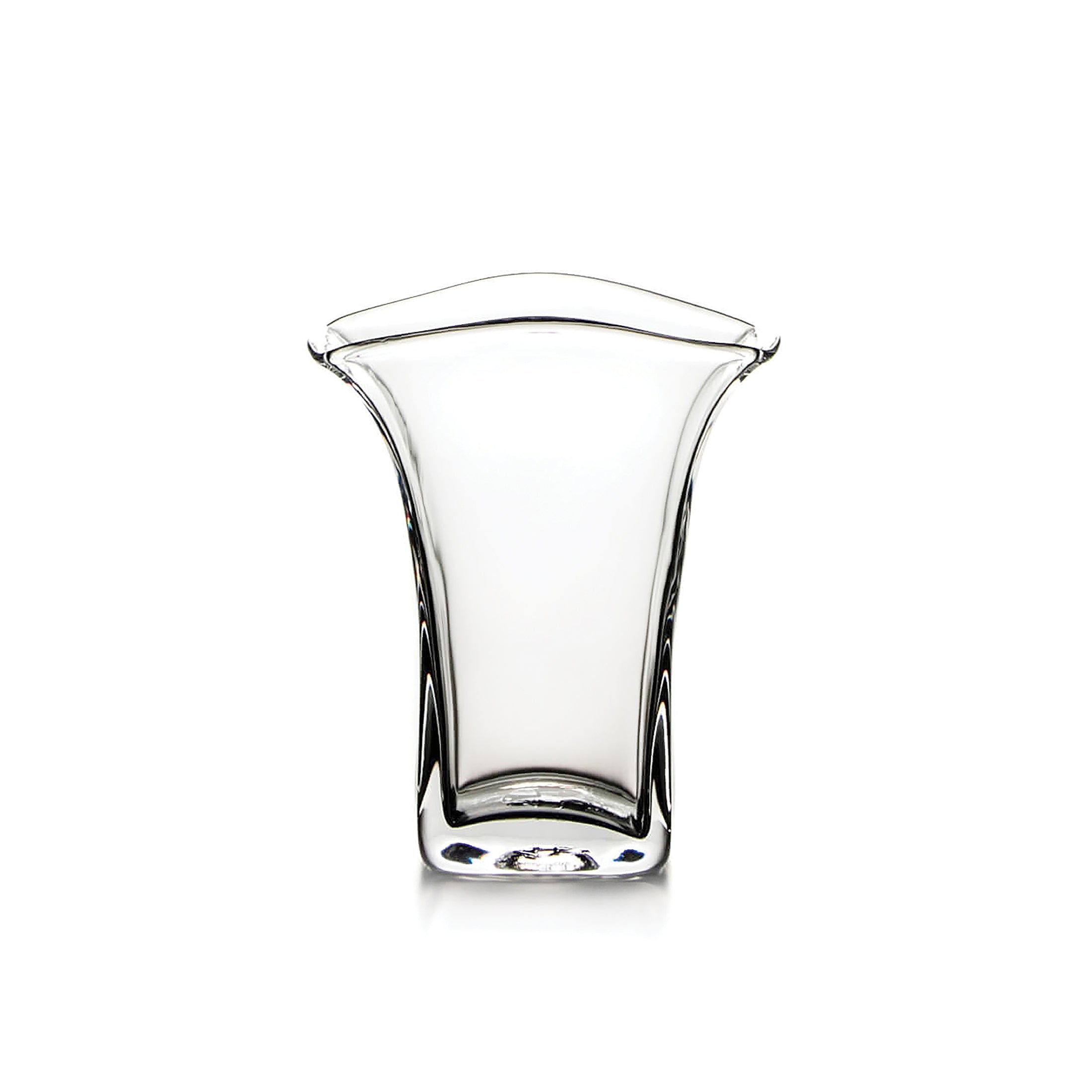 Clear glass tumbler with flared rim and curved sides tapering toward a squared base.