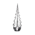 Clear glass evergreen tree figurine with pointed top and tiered branches on dark base.