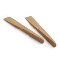 Two oak wood salad servers with flat, tapered bowls and rounded handles.