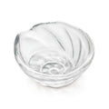 Small clear glass bowl with shell-shaped form and curved ridged surface detail.