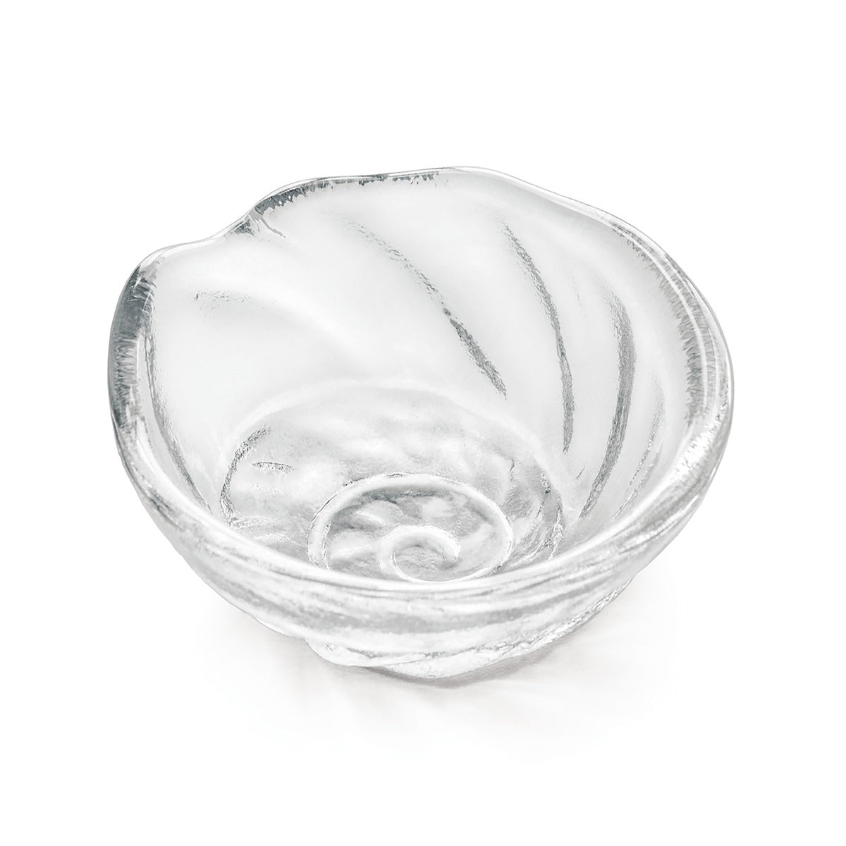 Small clear glass bowl with shell-shaped form and curved ridged surface detail.