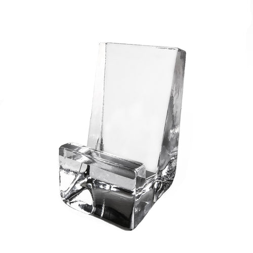 Clear acrylic phone holder with angled back panel and front slot for device placement.