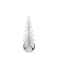 White frosted evergreen tree figurine with layered branches and round base.