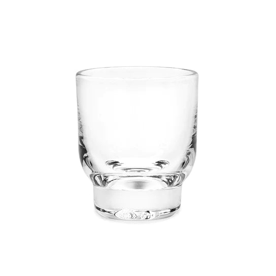 Clear glass tumbler with tapered cylindrical body and thick weighted base.