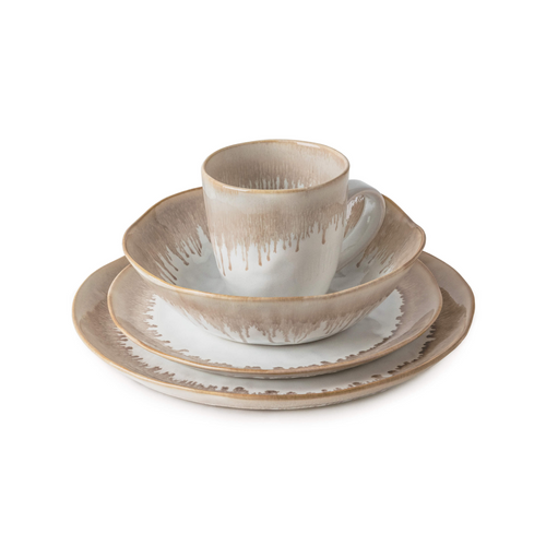 Five-piece place setting with stacked plates, bowl, and mug in cream and taupe with brushstroke pattern.