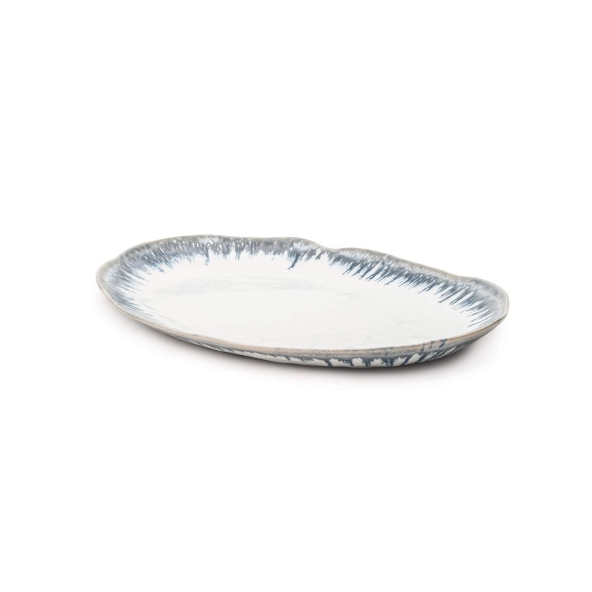 Oval ceramic platter with white center and blue brushstroke pattern along the rim.