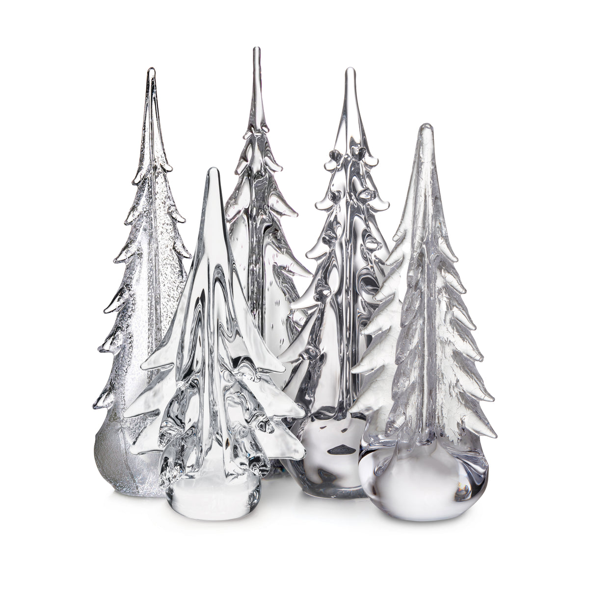 Set of five clear glass evergreen trees with pointed tops and textured branches on round bases.