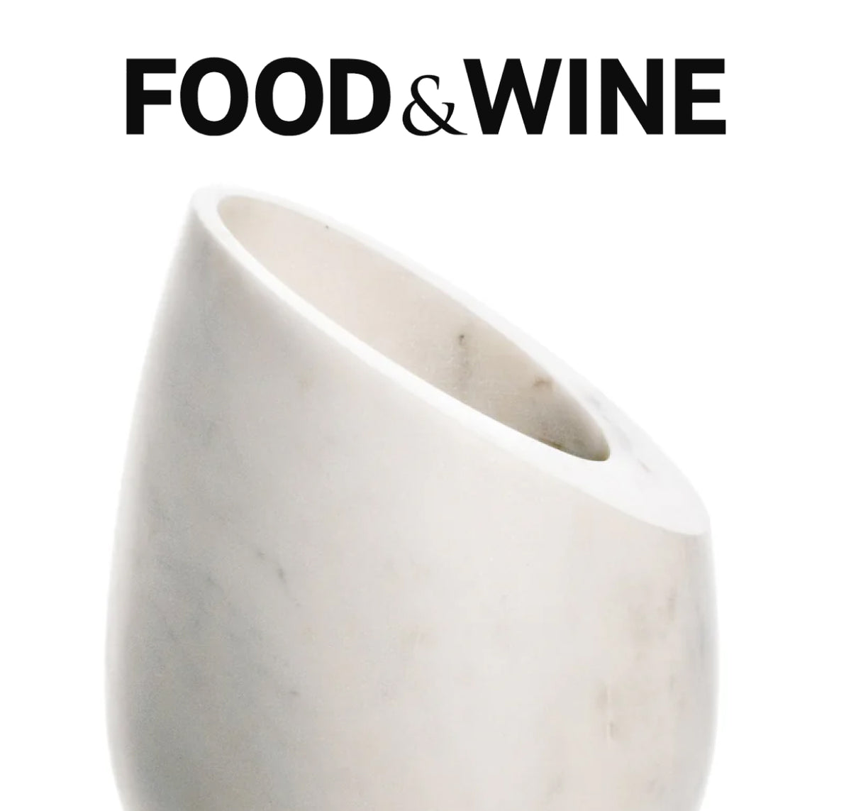 Food & Wine feature: Simon Pearce White Marble Wine Chiller, a smooth asymmetrical white marble vessel photographed on a white background
