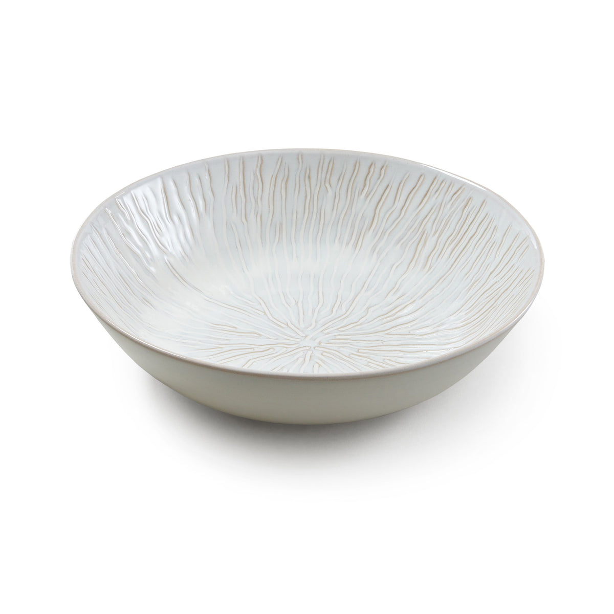 White ceramic serving bowl with radiating line pattern throughout interior and exterior.