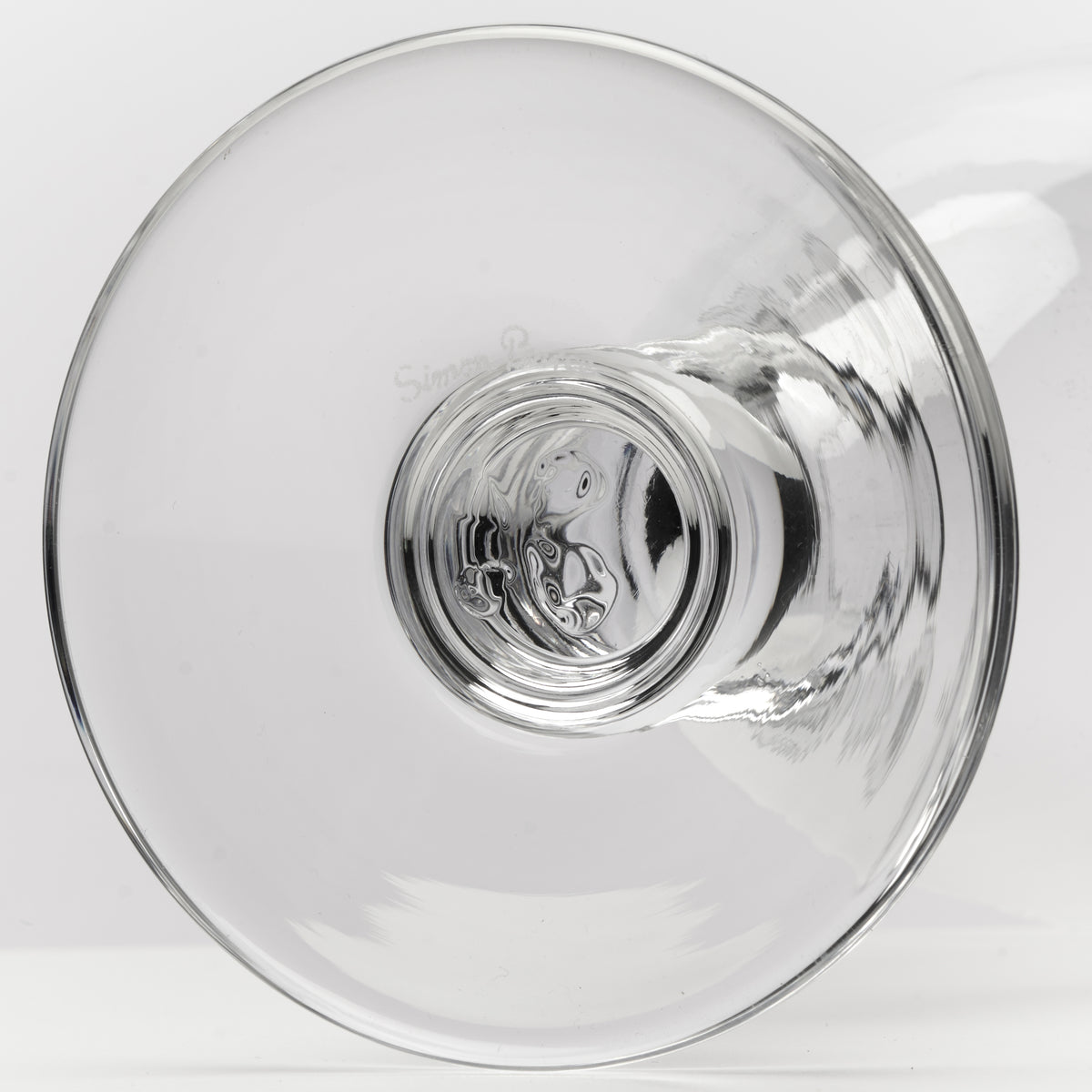 Clear glass stemware, photographed from the bottom against a white background.