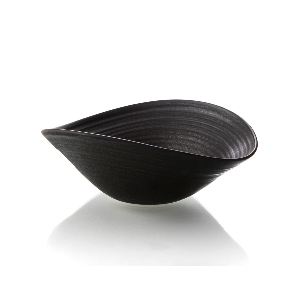 Black ceramic serving bowl with curved sides and a pouring spout on one end.
