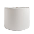 White linen barrel-shaped lamp shade with metal top ring and seam detail.