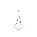 White glass sailboat sculpture with tall curved sail and wide base on white background.
